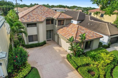 Lovely lakefront four bedroom plus den/office Patio C home with on Frenchmans Creek Country Club in Florida - for sale on GolfHomes.com, golf home, golf lot