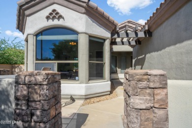 Elegant Former Model Home on the 7th Hole in Laughlin Ranch Golf on Laughlin Ranch Golf Club in Arizona - for sale on GolfHomes.com, golf home, golf lot