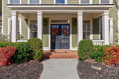 Inviting and charming, the rocking-chair brick front porch on Reunion Golf Club in Georgia - for sale on GolfHomes.com, golf home, golf lot