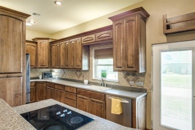 You found it! Lovingly maintained and improved by the current on Pecan Plantation Country Club in Texas - for sale on GolfHomes.com, golf home, golf lot