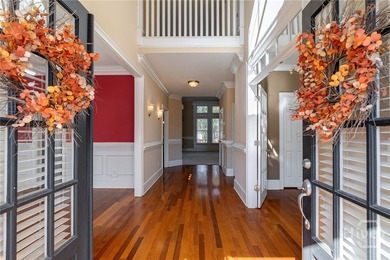 Inviting and charming, the rocking-chair brick front porch on Reunion Golf Club in Georgia - for sale on GolfHomes.com, golf home, golf lot
