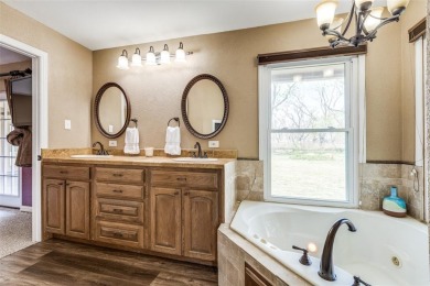 You found it! Lovingly maintained and improved by the current on Pecan Plantation Country Club in Texas - for sale on GolfHomes.com, golf home, golf lot