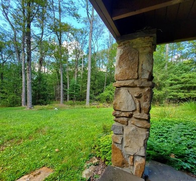 Imagine living in the heart of the Laurel Highlands. Surrounded on Kings Mountain Golf Course in Pennsylvania - for sale on GolfHomes.com, golf home, golf lot