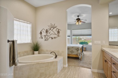 Elegant Former Model Home on the 7th Hole in Laughlin Ranch Golf on Laughlin Ranch Golf Club in Arizona - for sale on GolfHomes.com, golf home, golf lot