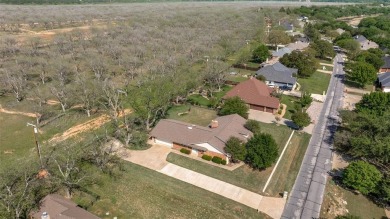 You found it! Lovingly maintained and improved by the current on Pecan Plantation Country Club in Texas - for sale on GolfHomes.com, golf home, golf lot
