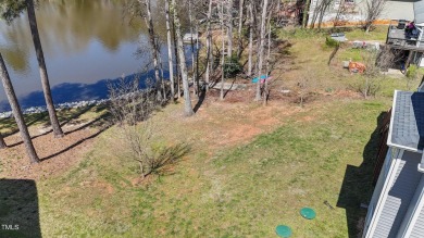 STUNNING LAKEFRONT NOW AVAILABLE!! Close to 3000 SQ FT of Luxury on River Golf and County Club at Lake Royale in North Carolina - for sale on GolfHomes.com, golf home, golf lot
