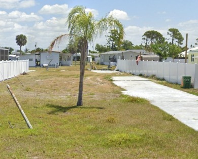 WOW! Waterfront lot in Mobile Gardens just waiting for you to on Oyster Creek Golf Club in Florida - for sale on GolfHomes.com, golf home, golf lot