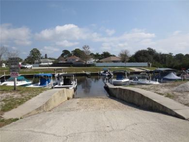 WOW! Waterfront lot in Mobile Gardens just waiting for you to on Oyster Creek Golf Club in Florida - for sale on GolfHomes.com, golf home, golf lot