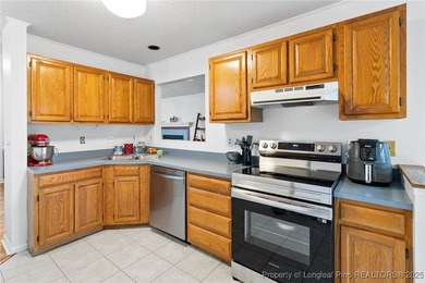 Charming and well-kept home in a quiet Pinehurst cul-de-sac! on Pinehurst Golf Course No. 8 in North Carolina - for sale on GolfHomes.com, golf home, golf lot