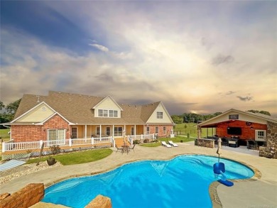 Luxurious 6 bedroom, 4.5 bath home on the 5th hole of Riverlinks on Tahlequah City Golf Course in Oklahoma - for sale on GolfHomes.com, golf home, golf lot