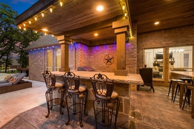 Stunning luxury home on a huge corner lot in the only 24-7 gated on The Golf Club at Resort Eagle Mountain Lake in Texas - for sale on GolfHomes.com, golf home, golf lot