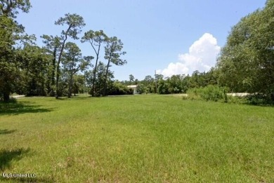 Welcome to a prime opportunity in the serene Henderson Point on Pass Christian Isles Golf Club in Mississippi - for sale on GolfHomes.com, golf home, golf lot