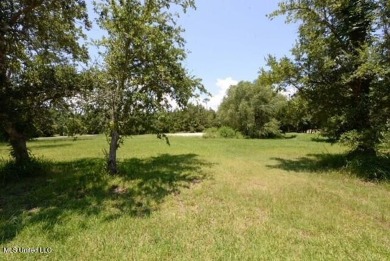 Welcome to a prime opportunity in the serene Henderson Point on Pass Christian Isles Golf Club in Mississippi - for sale on GolfHomes.com, golf home, golf lot
