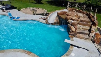 Luxurious 6 bedroom, 4.5 bath home on the 5th hole of Riverlinks on Tahlequah City Golf Course in Oklahoma - for sale on GolfHomes.com, golf home, golf lot