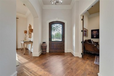 Stunning luxury home on a huge corner lot in the only 24-7 gated on The Golf Club at Resort Eagle Mountain Lake in Texas - for sale on GolfHomes.com, golf home, golf lot