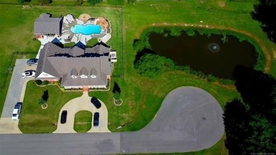 Luxurious 6 bedroom, 4.5 bath home on the 5th hole of Riverlinks on Tahlequah City Golf Course in Oklahoma - for sale on GolfHomes.com, golf home, golf lot