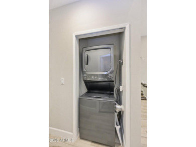 Single-level remodeled jewel box on a prime corner overlooking on Gainey Ranch Golf Club in Arizona - for sale on GolfHomes.com, golf home, golf lot