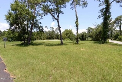 Welcome to a prime opportunity in the serene Henderson Point on Pass Christian Isles Golf Club in Mississippi - for sale on GolfHomes.com, golf home, golf lot