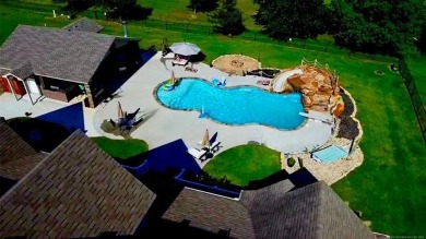 Luxurious 6 bedroom, 4.5 bath home on the 5th hole of Riverlinks on Tahlequah City Golf Course in Oklahoma - for sale on GolfHomes.com, golf home, golf lot