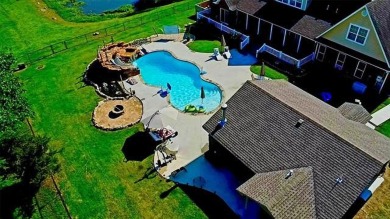 Luxurious 6 bedroom, 4.5 bath home on the 5th hole of Riverlinks on Tahlequah City Golf Course in Oklahoma - for sale on GolfHomes.com, golf home, golf lot