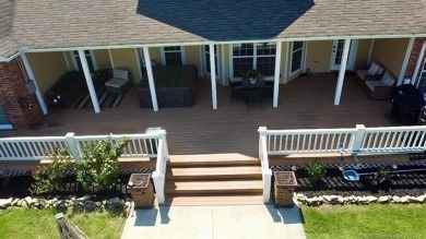 Luxurious 6 bedroom, 4.5 bath home on the 5th hole of Riverlinks on Tahlequah City Golf Course in Oklahoma - for sale on GolfHomes.com, golf home, golf lot