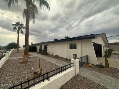 Discover this stunning 3-bedroom, 2.5-bath home nestled next to on London Bridge Golf Course in Arizona - for sale on GolfHomes.com, golf home, golf lot