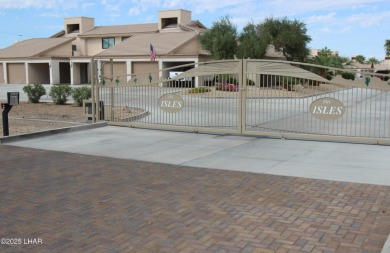 Exclusive, gated, private, and Turn-key! Island location just on London Bridge Golf Course in Arizona - for sale on GolfHomes.com, golf home, golf lot