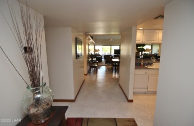 Exclusive, gated, private, and Turn-key! Island location just on London Bridge Golf Course in Arizona - for sale on GolfHomes.com, golf home, golf lot