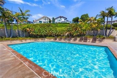 Step out onto the patio and indulge in serene mountainous views on Monarch Beach Golf Links in California - for sale on GolfHomes.com, golf home, golf lot