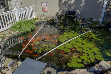 Not only is this truly unique one-owner Lake Ashton Golf Club on Lake Ashton Golf Club in Florida - for sale on GolfHomes.com, golf home, golf lot