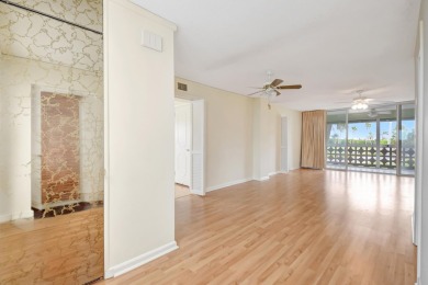 Experience the best of downtown Lake Worth Beach in this on Lake Worth Municipal Golf Course in Florida - for sale on GolfHomes.com, golf home, golf lot