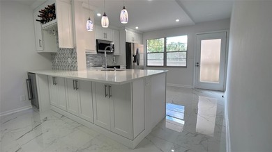 Fully renovated 2-Bed, 2-Bath Condo in 55+Community at WYNMOOR on Wynmoor Golf Course in Florida - for sale on GolfHomes.com, golf home, golf lot