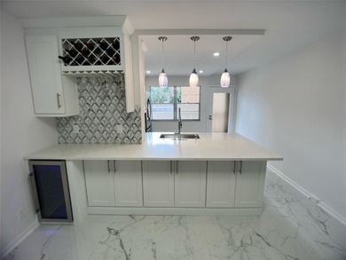 Fully renovated 2-Bed, 2-Bath Condo in 55+Community at WYNMOOR on Wynmoor Golf Course in Florida - for sale on GolfHomes.com, golf home, golf lot