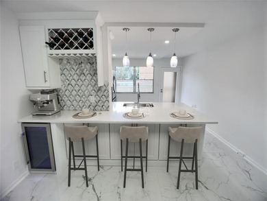 Fully renovated 2-Bed, 2-Bath Condo in 55+Community at WYNMOOR on Wynmoor Golf Course in Florida - for sale on GolfHomes.com, golf home, golf lot