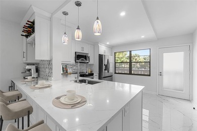 Fully renovated 2-Bed, 2-Bath Condo in 55+Community at WYNMOOR on Wynmoor Golf Course in Florida - for sale on GolfHomes.com, golf home, golf lot