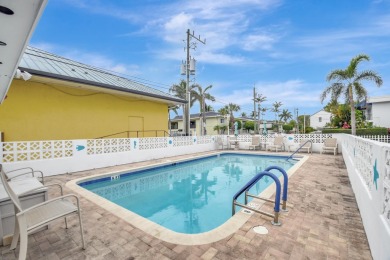 Experience the best of downtown Lake Worth Beach in this on Lake Worth Municipal Golf Course in Florida - for sale on GolfHomes.com, golf home, golf lot