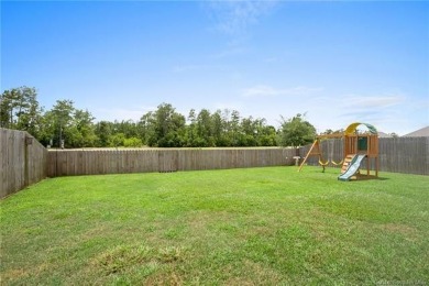 Welcome to this beautifully designed 5-bedroom, 2.5-bathroom on The National Golf Club of Louisiana in Louisiana - for sale on GolfHomes.com, golf home, golf lot