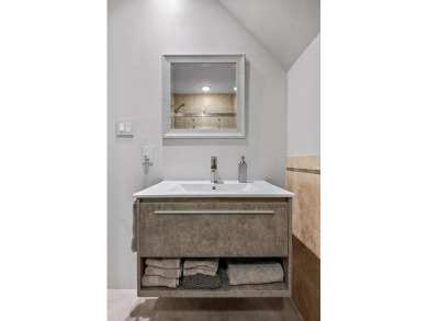 With its simple, contemporary design, this stunning one bedroom on Windstone Golf Club in Georgia - for sale on GolfHomes.com, golf home, golf lot
