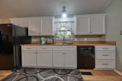 Welcome to this beautifully maintained and updated home in the on Hide-A-Way Lake Golf Course in Texas - for sale on GolfHomes.com, golf home, golf lot