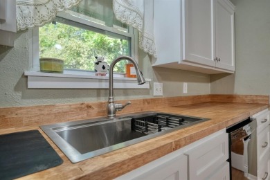 Welcome to this beautifully maintained and updated home in the on Hide-A-Way Lake Golf Course in Texas - for sale on GolfHomes.com, golf home, golf lot