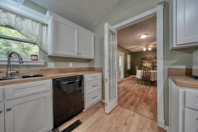 Welcome to this beautifully maintained and updated home in the on Hide-A-Way Lake Golf Course in Texas - for sale on GolfHomes.com, golf home, golf lot