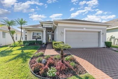 Stunning Ridge Cove floorplan with exceptional upgrades on Ridgewood Lakes Golf and Country Club in Florida - for sale on GolfHomes.com, golf home, golf lot