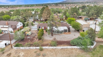 Experience luxury living at 806 Lamp Post Circle Southeast in on The Canyon Club in New Mexico - for sale on GolfHomes.com, golf home, golf lot