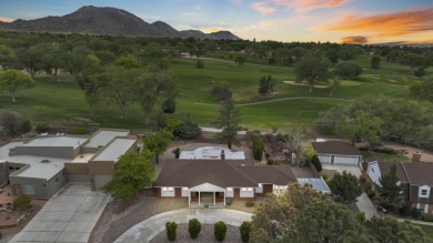 Experience luxury living at 806 Lamp Post Circle Southeast in on The Canyon Club in New Mexico - for sale on GolfHomes.com, golf home, golf lot
