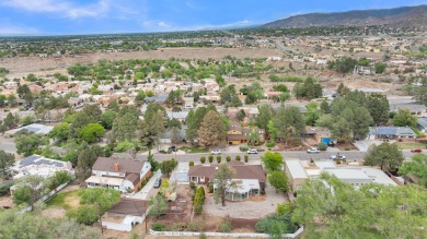 Experience luxury living at 806 Lamp Post Circle Southeast in on The Canyon Club in New Mexico - for sale on GolfHomes.com, golf home, golf lot