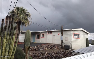 Enjoy stunning views from this beautifully maintained home on Queen Valley Golf Course in Arizona - for sale on GolfHomes.com, golf home, golf lot