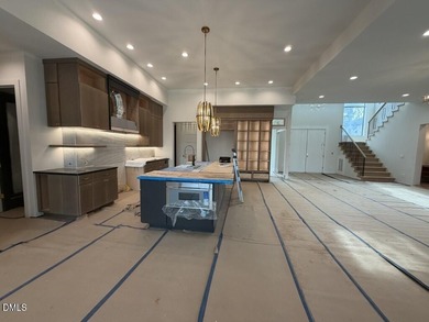 Stunning luxury home and pool house on NRCC 9th Fairway of the on North Ridge Country Club in North Carolina - for sale on GolfHomes.com, golf home, golf lot