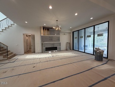 Stunning luxury home and pool house on NRCC 9th Fairway of the on North Ridge Country Club in North Carolina - for sale on GolfHomes.com, golf home, golf lot