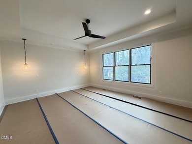 Stunning luxury home and pool house on NRCC 9th Fairway of the on North Ridge Country Club in North Carolina - for sale on GolfHomes.com, golf home, golf lot