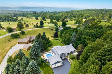 Beautiful view of Crystal Lake from this updated 4 BR home on Crystal Lake Golf Club in Michigan - for sale on GolfHomes.com, golf home, golf lot